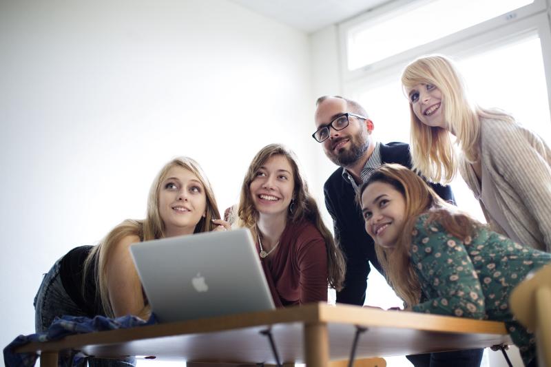 Students pictured with laptop