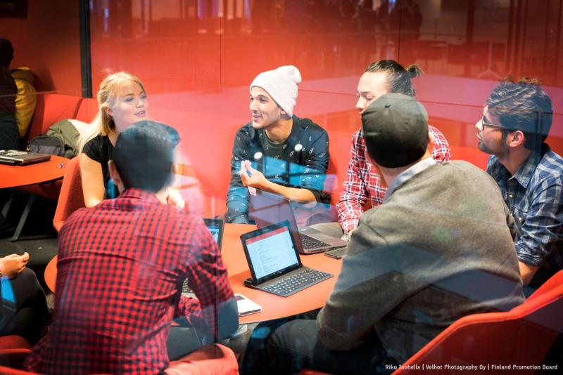 Students discussing around the table