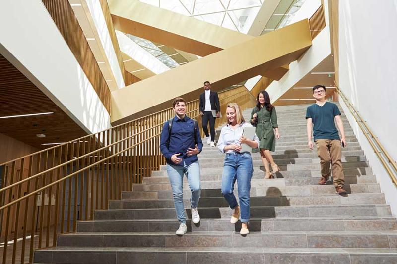 Students walking down a staircase