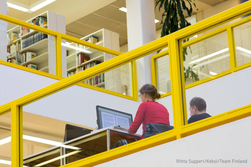 students sitting in a library